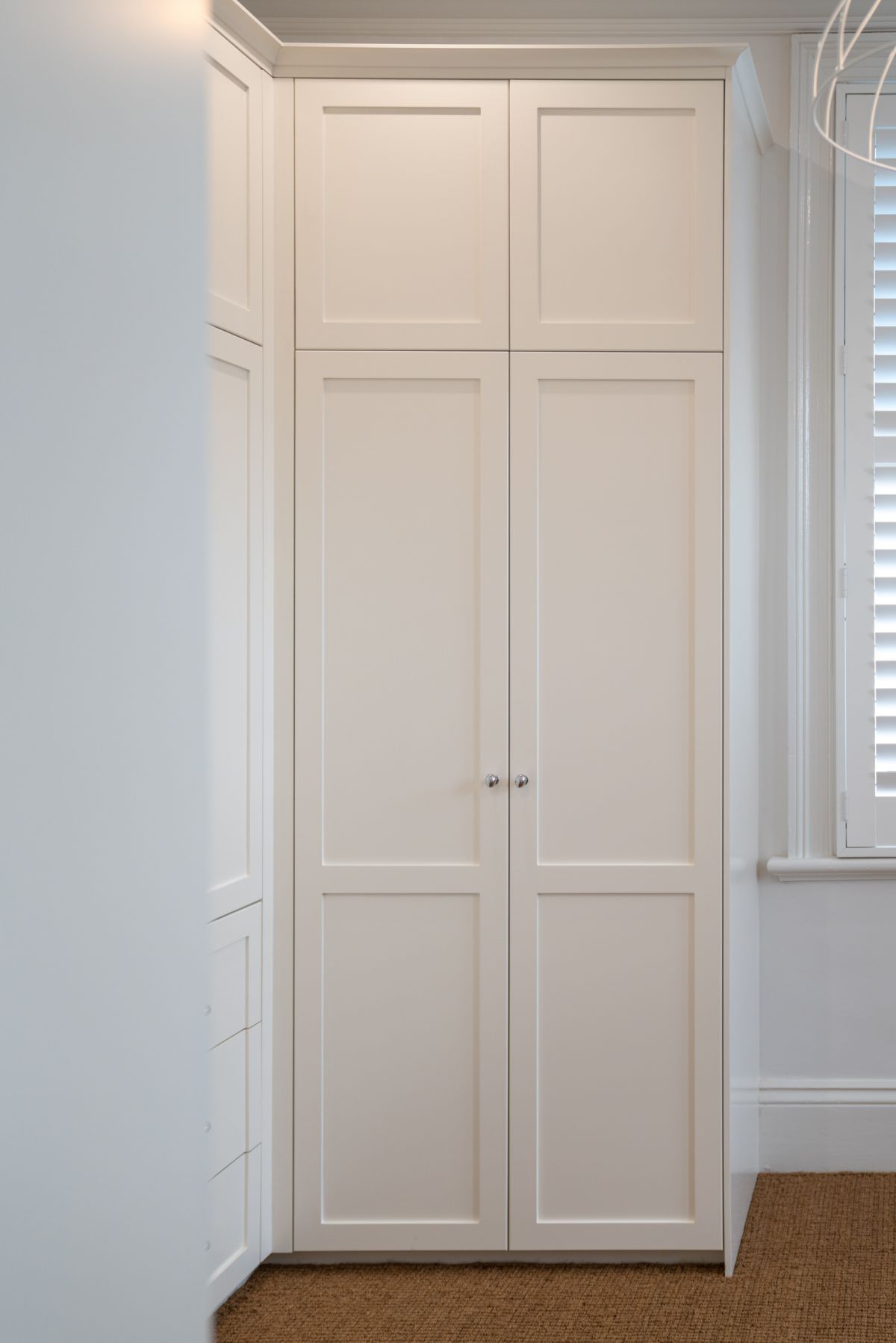 Attached corner wardrobe as part of Boston built-in