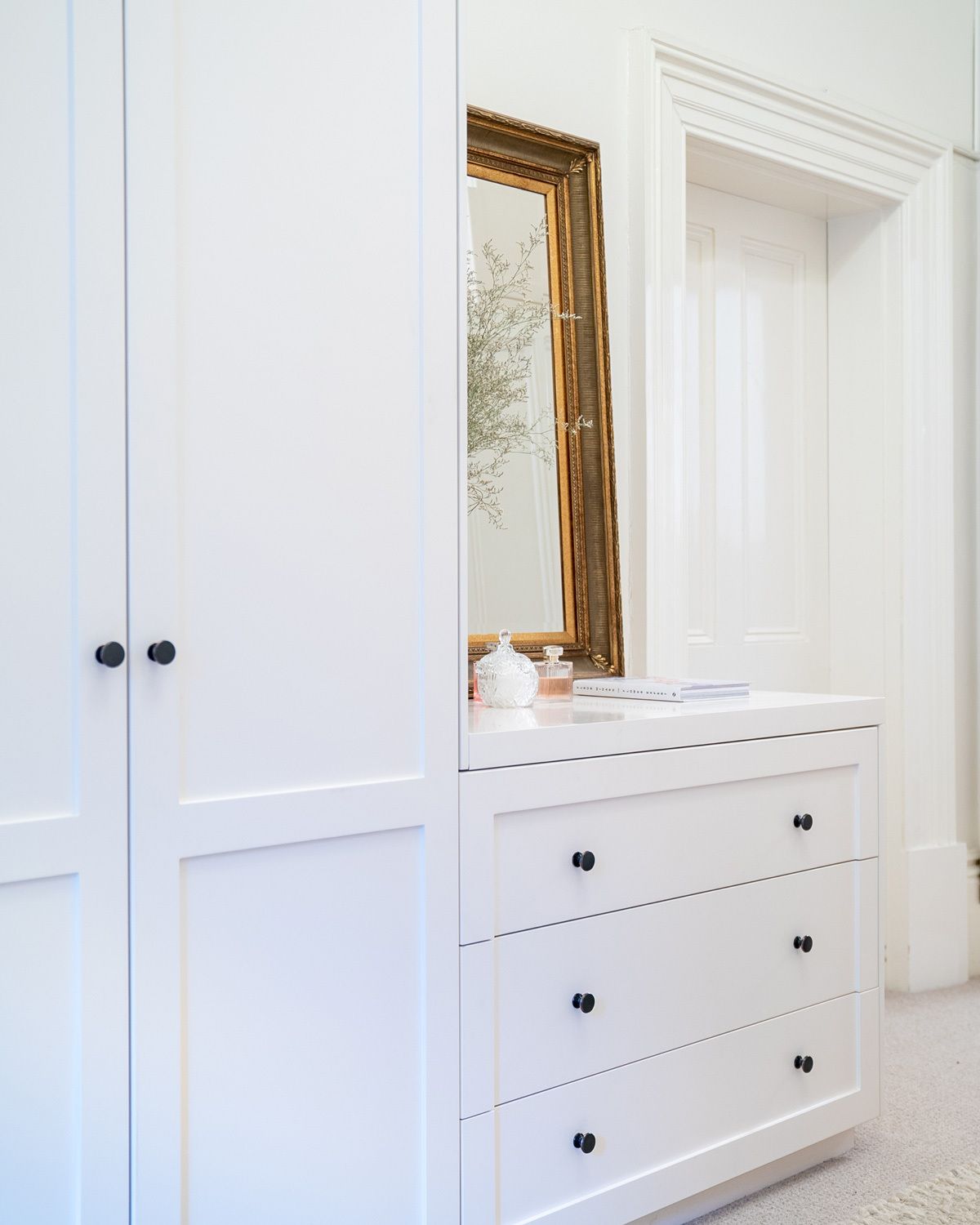 Boston hinged door built-in wardrobe with drawers in dressing room