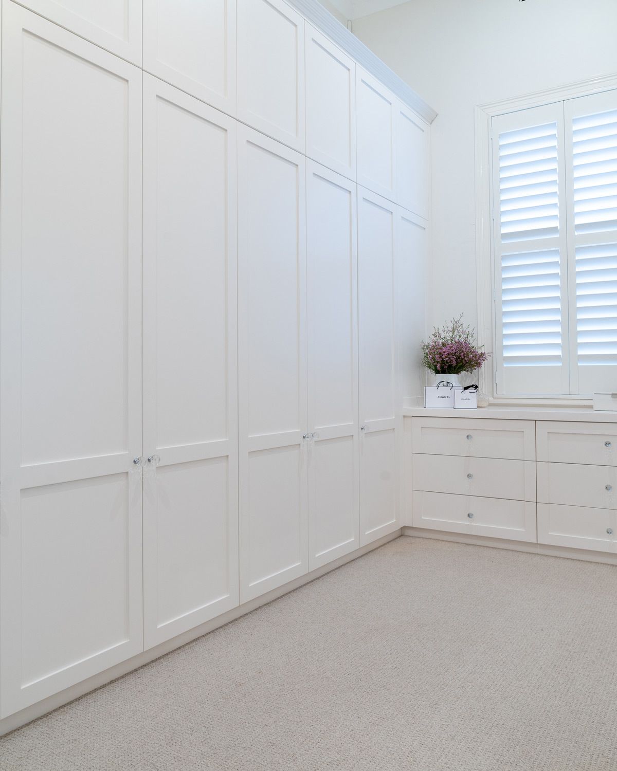 Wall to wall hinged door built-in wardrobe in dressing room