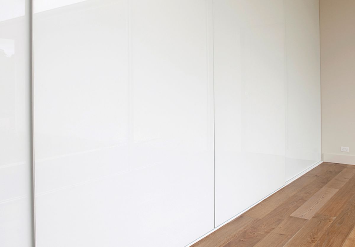 Modern, frameless Portsea sliding door built-in wardrobe