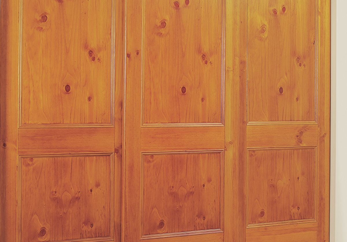 Sommerset built-in wardrobe with triple wooden sliding doors