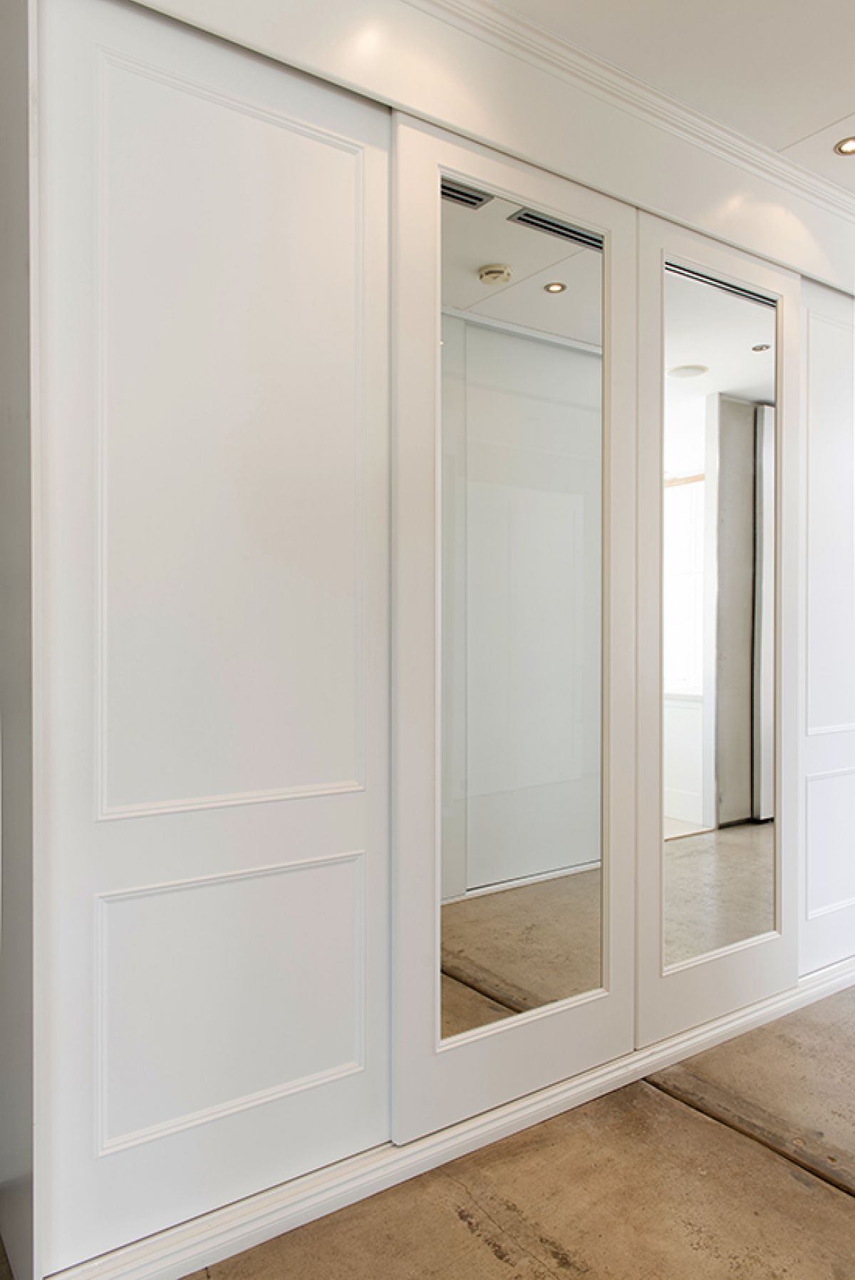 4 door sliding door Sommerset wardrobe with feature mirrors