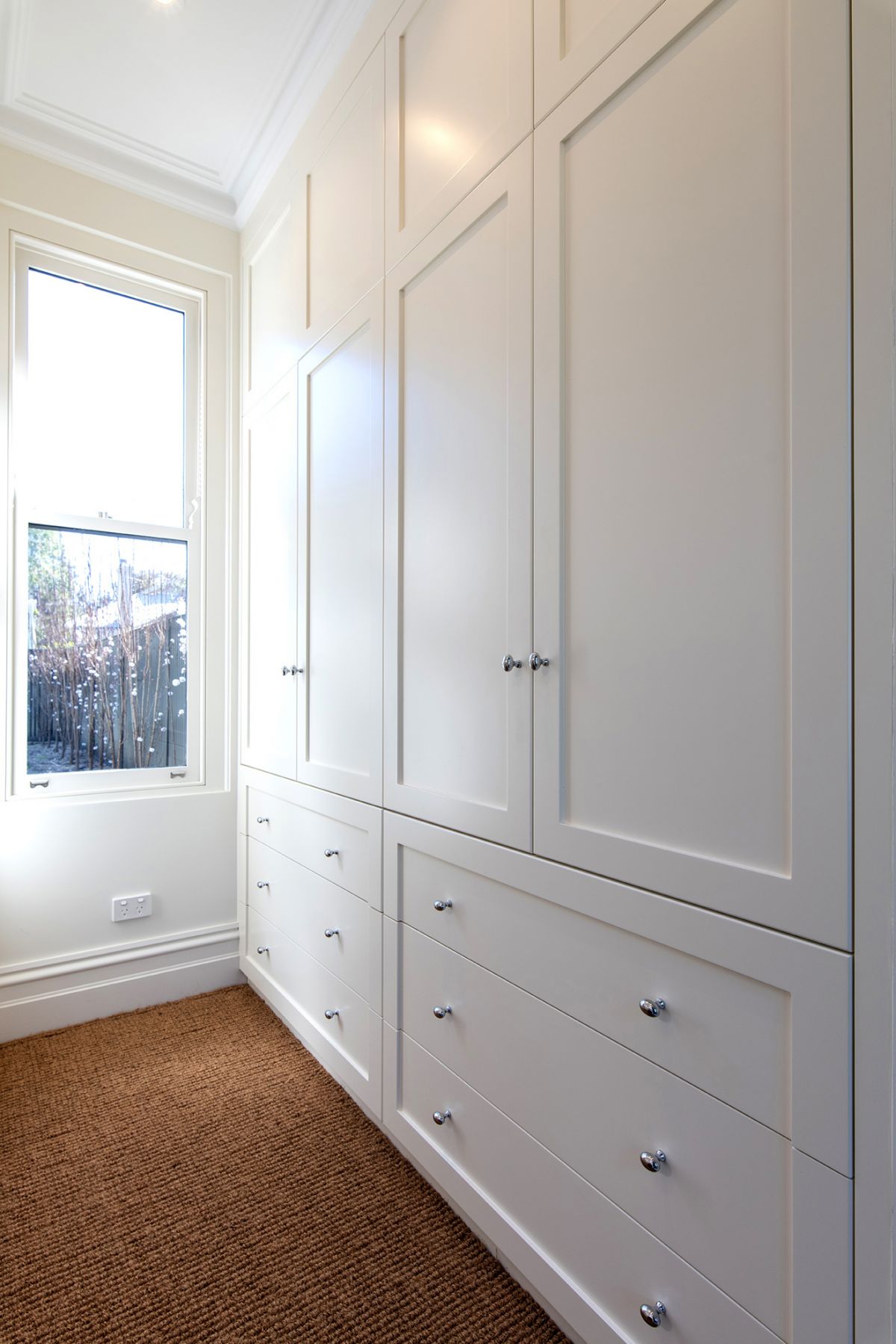 Built-in drawers in Boston hinged door wardrobe