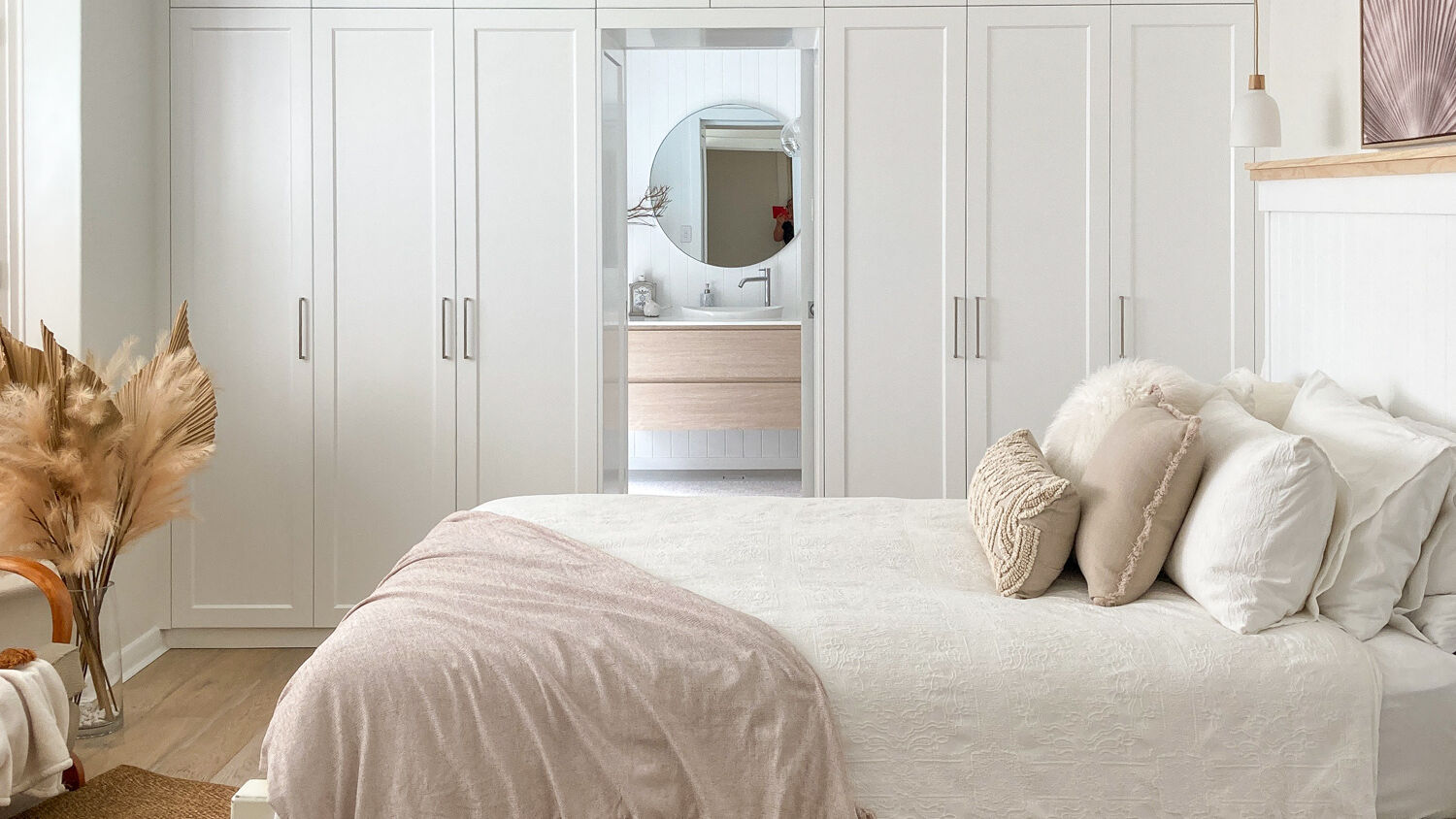 Master bedroom floor-to-ceiling wardrobe featuring single-panel Boston doors in Dulux Vivid White 2-pack satin finish, custom-built by Packers Adelaide.