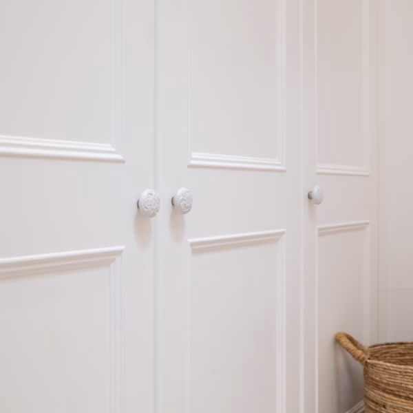 Traditional Oxford wardrobe featuring bespoke inlay moulding and custom handles in a 2-pack satin finish, professionally handcrafted by Packers.